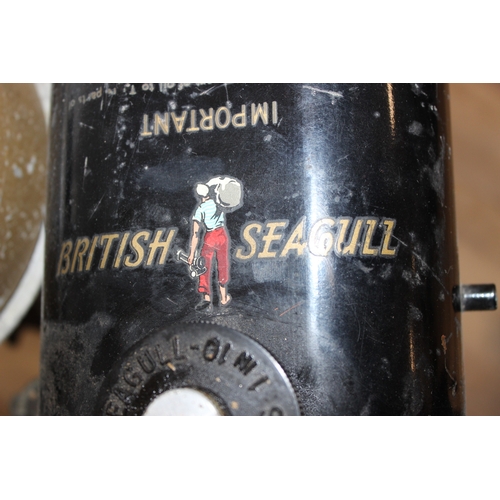 703 - A vintage Seagull outboard boat motor