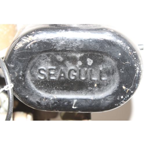 703 - A vintage Seagull outboard boat motor