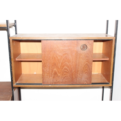 10 - A retro modular Ladderax style shelving unit by Avalon, comprising of 3 cupboards, a 3 drawer chest ... 