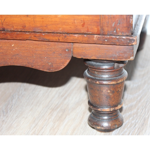 25 - An antique mahogany side hall stand or sideboard of unusual construction, an open recess under a she... 