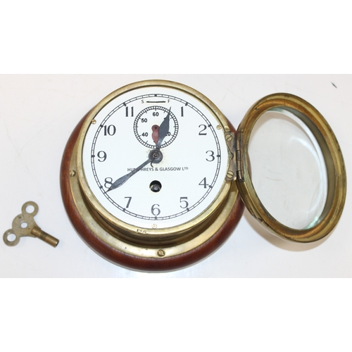 1352 - Vintage brass cased bulk-head clock by Humphreys & Glasgow Ltd, with key, approx 20cm diameter x 12c... 