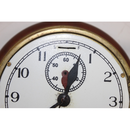 1352 - Vintage brass cased bulk-head clock by Humphreys & Glasgow Ltd, with key, approx 20cm diameter x 12c... 