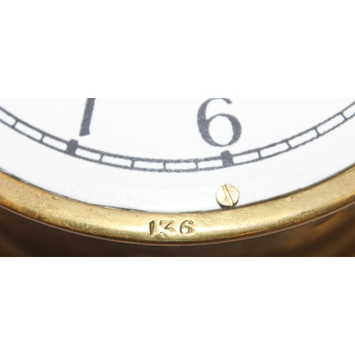 1352 - Vintage brass cased bulk-head clock by Humphreys & Glasgow Ltd, with key, approx 20cm diameter x 12c... 