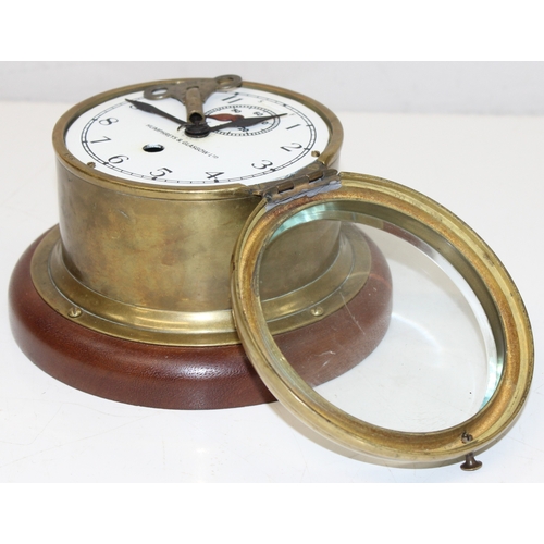 1352 - Vintage brass cased bulk-head clock by Humphreys & Glasgow Ltd, with key, approx 20cm diameter x 12c... 