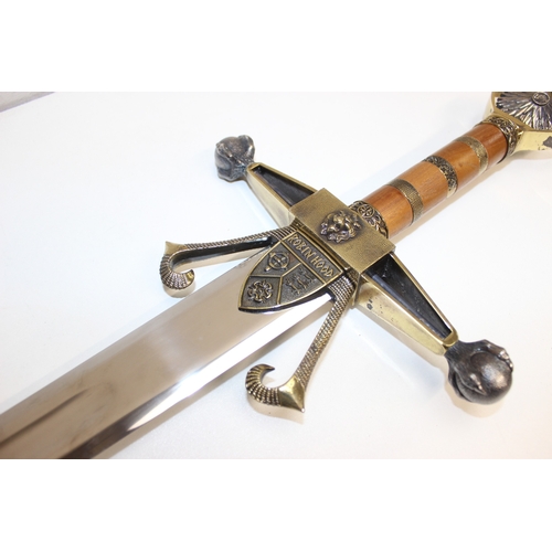 1409 - Large Robin Hood Broadsword and a pair of Fleur de Lys long gun or sword mounts, sword approx 119cm