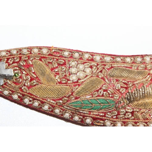 1411 - 2 alloy-hilted Kukri knives, 1 with jewelled-red velvet scabbard, the other longer and with jewelled... 