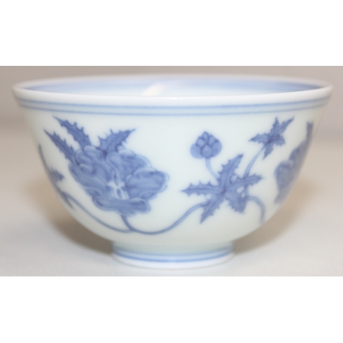 1455 - A Chinese blue & white porcelain tea bowl decorated with floral motifs, Chenghua (1464-1487) 6 chara... 