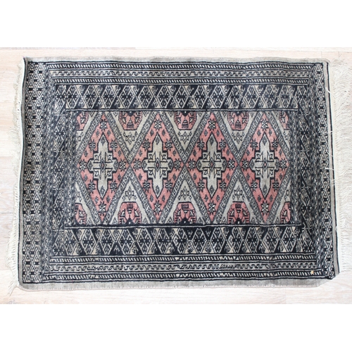 206 - 2 small decorative rugs, largest approx 96cm x 64cm