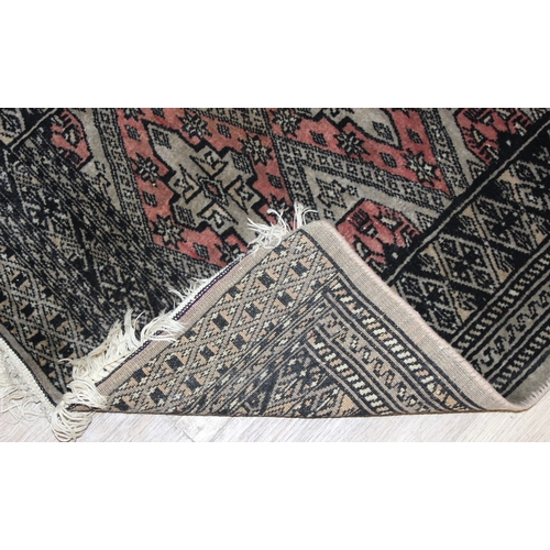 206 - 2 small decorative rugs, largest approx 96cm x 64cm