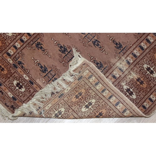 206 - 2 small decorative rugs, largest approx 96cm x 64cm