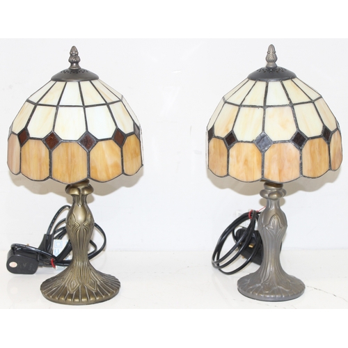 241 - Matched pair of Tiffany style lamps with bronzed Art Nouveau style bases, approx 38cm