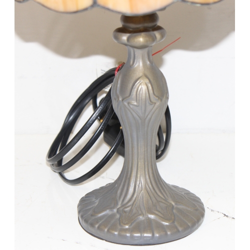 241 - Matched pair of Tiffany style lamps with bronzed Art Nouveau style bases, approx 38cm