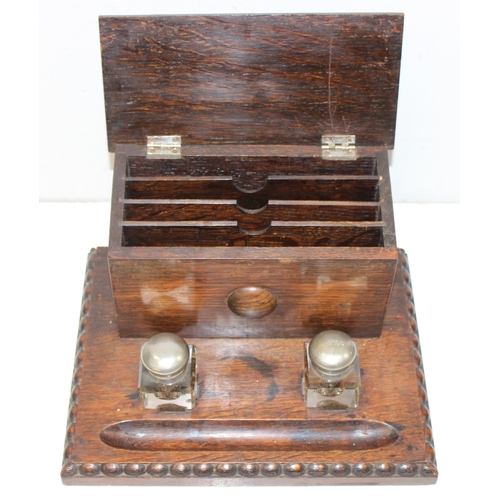 274 - Vintage oak desktop pen and inkwell stand with letter/stationery compartment, and a small table mirr... 