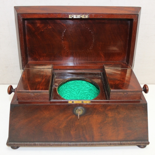 277 - Regency period mahogany sarcophagus tea caddy with Mother of Pearl inlay on bun feet, approx 34cm x ... 