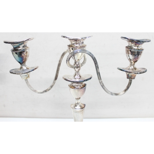 1048 - 2 pair of silver-plated 3-branch metamorphic candelabras, the largest approx 30cm H