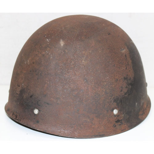 1420 - Qty of military items to incl bugle, books, a vintage military helmet with liner, marked 69M or W69,... 