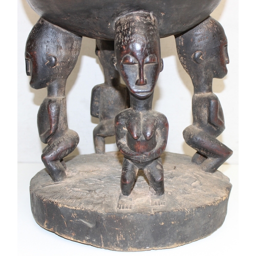 1613 - A large unusual African carved wooden item, believed to be a carved wooden medicine pot by the Dogon... 