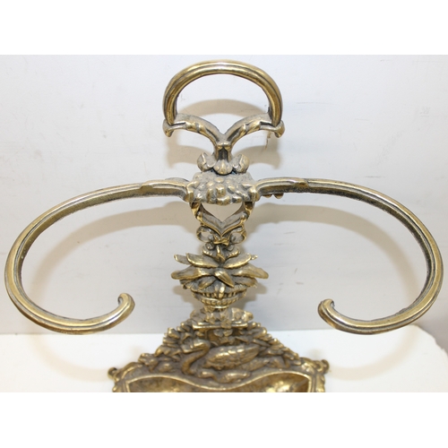 279 - Antique brass Rococo style umbrella or stick stand, decorated with swans and ivy, approx 67cm tall