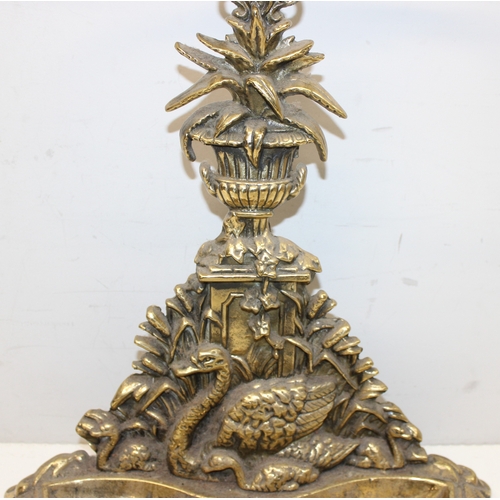 279 - Antique brass Rococo style umbrella or stick stand, decorated with swans and ivy, approx 67cm tall