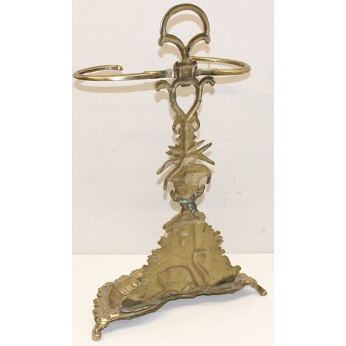 279 - Antique brass Rococo style umbrella or stick stand, decorated with swans and ivy, approx 67cm tall