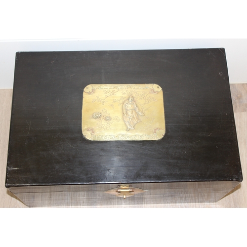 283 - A vintage Oriental black lacquered box with embossed brass fittings, approx 62cm wide x 40cm deep x ... 