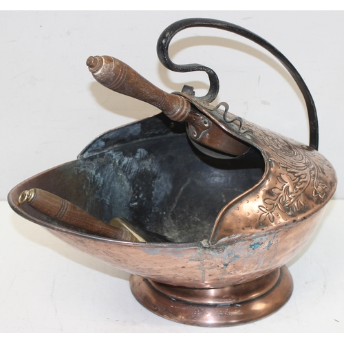 284 - An antique copper coal scuttle with wrought iron handle and scoop, approx 55cm wide