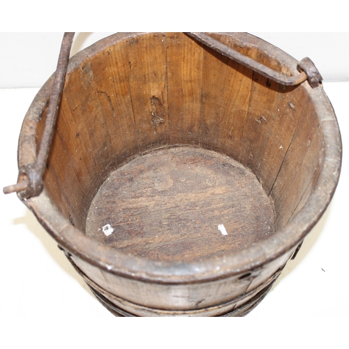 286 - Antique wooden water pale/bucket with iron attachments and banding, possibly Chinese, approx 34cm di... 