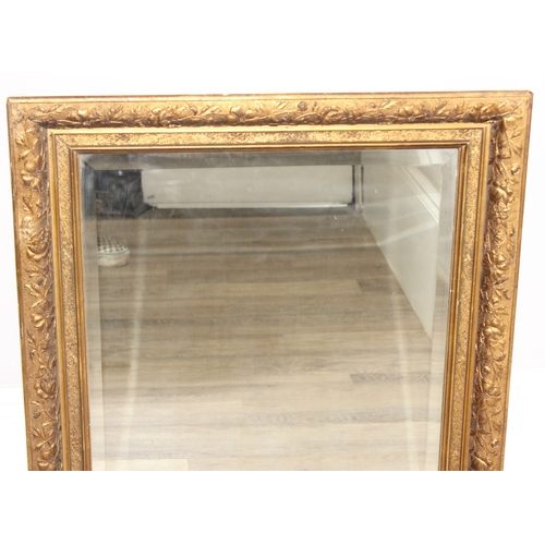 367 - An antique gilt framed wall mirror with bevelled glass panel, approx 85cm x 75cm