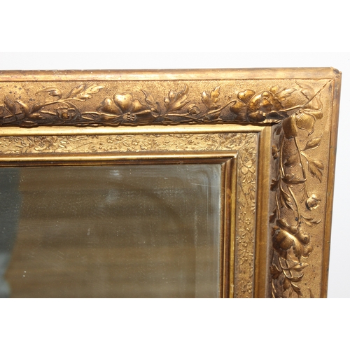 367 - An antique gilt framed wall mirror with bevelled glass panel, approx 85cm x 75cm