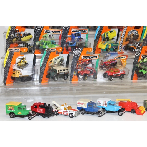 604 - Qty of Matchbox toy scale model vehicles, many in original packaging, some advertising such as Rownt... 