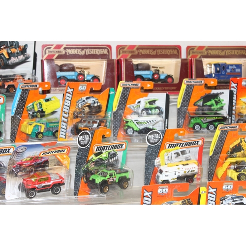 604 - Qty of Matchbox toy scale model vehicles, many in original packaging, some advertising such as Rownt... 