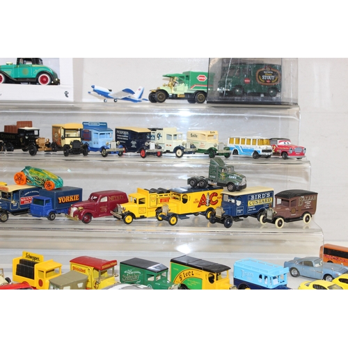 605 - Large qty of scale model vehicles, many in original packaging, mostly Lledo, some with advertising