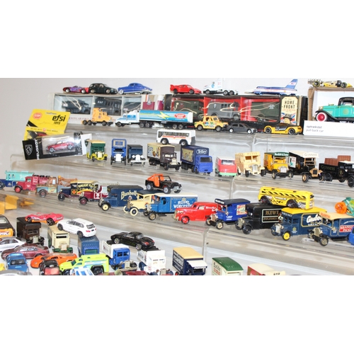 605 - Large qty of scale model vehicles, many in original packaging, mostly Lledo, some with advertising