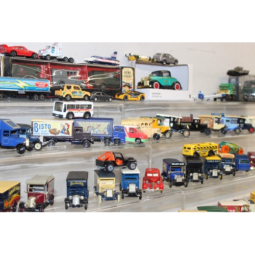 605 - Large qty of scale model vehicles, many in original packaging, mostly Lledo, some with advertising