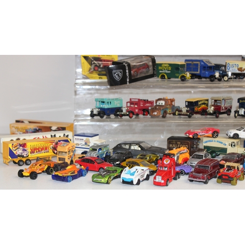 605 - Large qty of scale model vehicles, many in original packaging, mostly Lledo, some with advertising