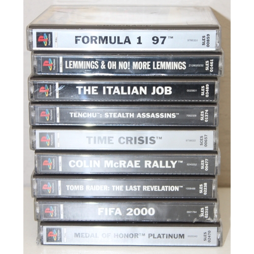 606 - Sony PlayStation (PS1) games console with controller and a number of games incl Formula 1 97, Colin ... 