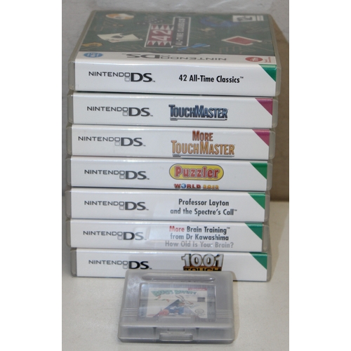 607 - Nintendo DS Lite handheld games console with associated games to incl Brain Training, Puzzler, Touch... 