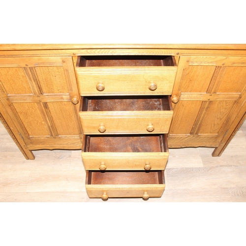 43 - Ercol old colonial range sideboard consisting of 4 drawers and 2 cupboards, approx 147cm wide x 50cm... 