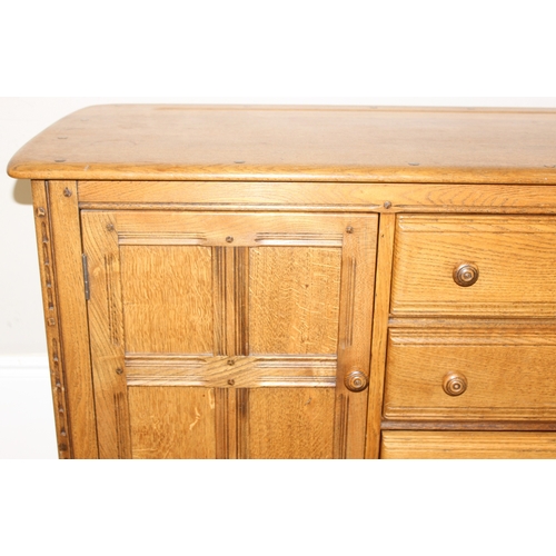 43 - Ercol old colonial range sideboard consisting of 4 drawers and 2 cupboards, approx 147cm wide x 50cm... 