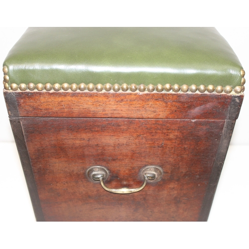 73 - Vintage green-leather topped box seat/stool with handles and interior storage compartment, on bun fe... 