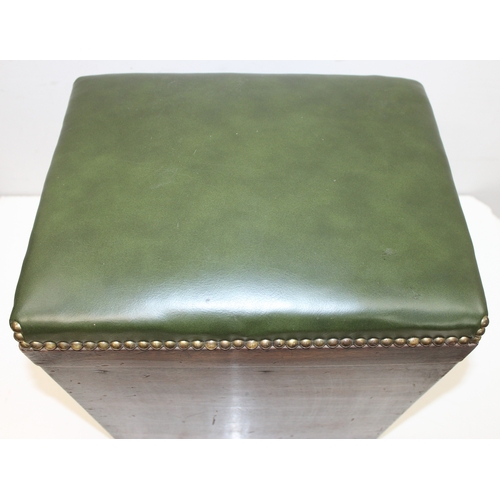 73 - Vintage green-leather topped box seat/stool with handles and interior storage compartment, on bun fe... 