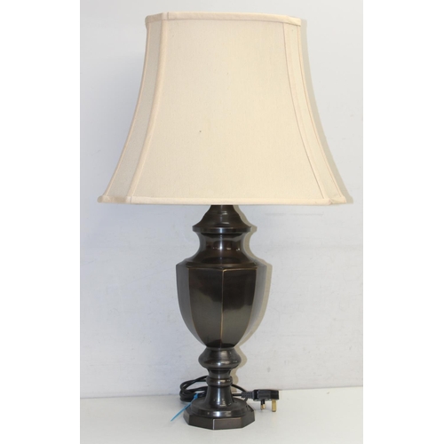 253 - A bronzed metal table lamp of octagonal form with shade, approx 75cm tall