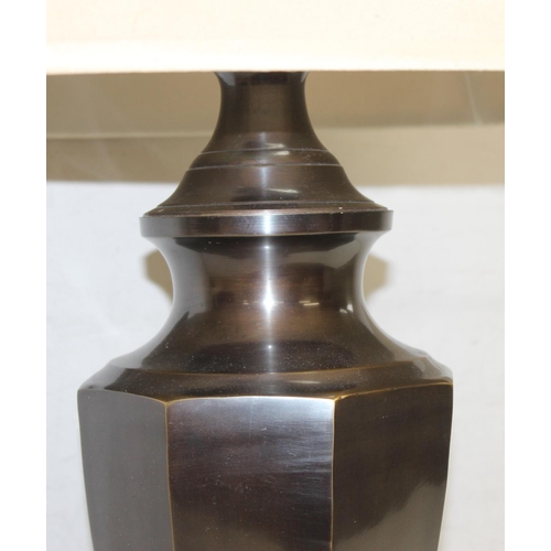 253 - A bronzed metal table lamp of octagonal form with shade, approx 75cm tall