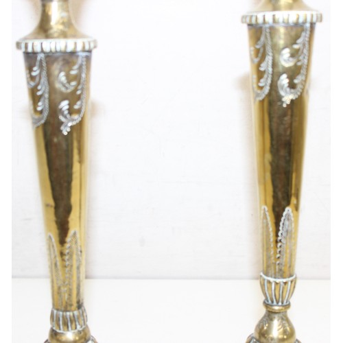 1640 - An impressive pair of tall brass candlesticks with classical decoration, tallest approx 38cm tall