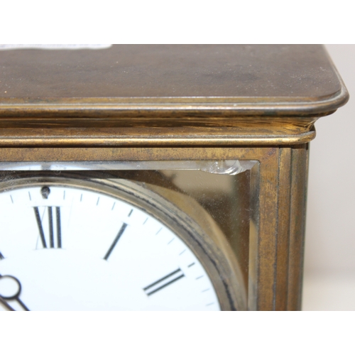 1363 - An early 20th century French four-glass mantel clock with white-enameled dial with Roman numerals, t... 