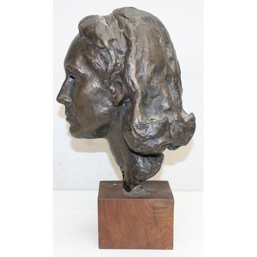 1480 - A mid-century bronze bust or sculpture of a young Lady Newall, mounted on an oak base, seemingly uns... 