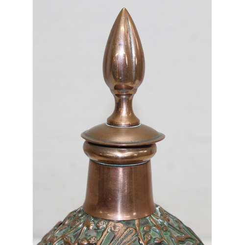 1482 - A highly decorative Haig's Dimple whisky bottle covered in pierced copper work, depicting flowers an... 