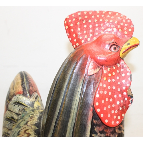 1639 - 2 large folk art style painted carved wooden models of chickens, the largest approx 75cm tall