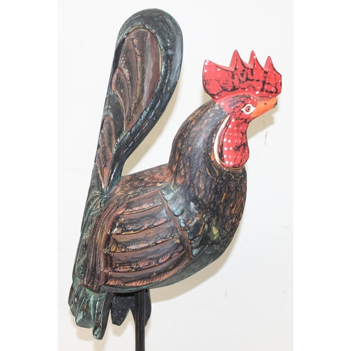 1639 - 2 large folk art style painted carved wooden models of chickens, the largest approx 75cm tall