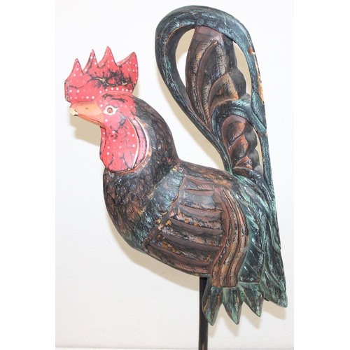 1639 - 2 large folk art style painted carved wooden models of chickens, the largest approx 75cm tall